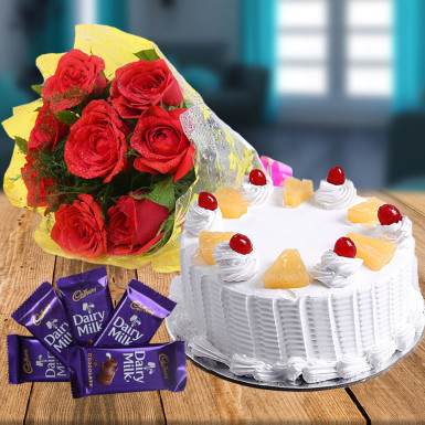 A Beautiful 12 Pink Roses Bunch And 1 kg Strawberry Cake (Online Cake and  Flowers Delivery In Dehradun) – India Cakes N Flowers